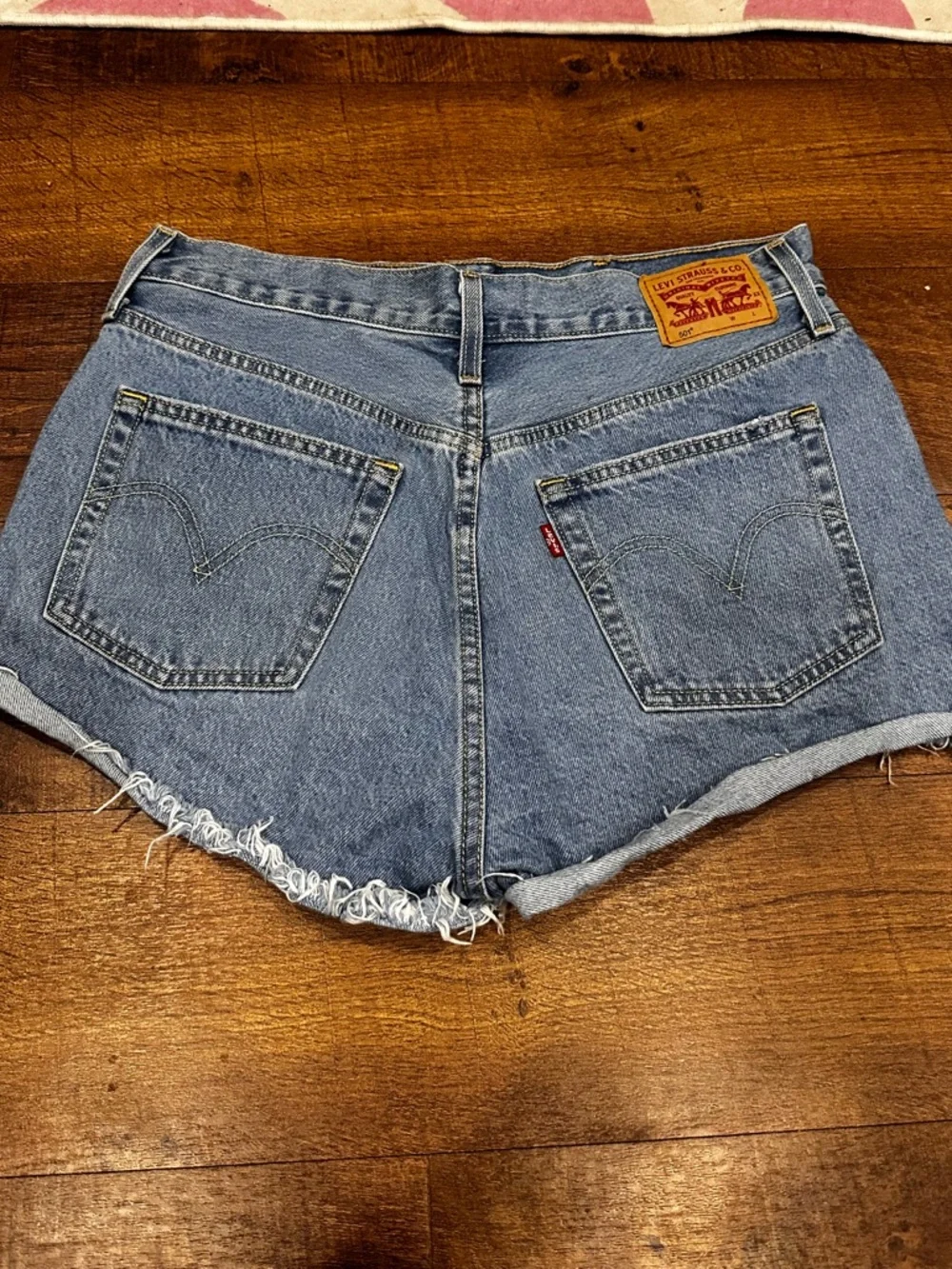 Levi's Distressed Light Blue High-Rise Denim Shorts